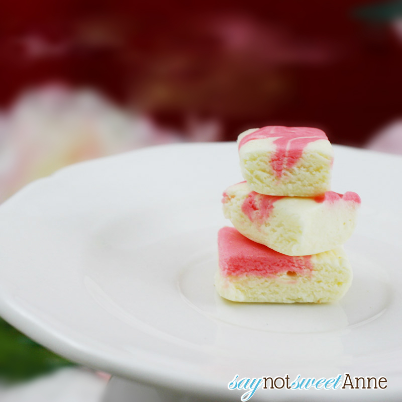 Easy and Almost Instant Strawberry Cheesecake Fudge! This recipe requires no candy thermometer, no boiling sugar, and has a rich creamy cheesecake flavor. | saynotsweetanne.com