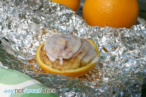 2 step Campfire Cinnamon Rolls! Great for camp, or on the grill. Easy enough for little helpers! more at Saynotsweetanne.com  #cinnamon #camp #food #orange #treat