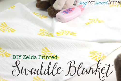 Easy DIY Swaddle Blanket - I printed mine with the Zelda Royal Crest!, but you could stamp your own or buy patterned fabric! | syanotsweetanne.com