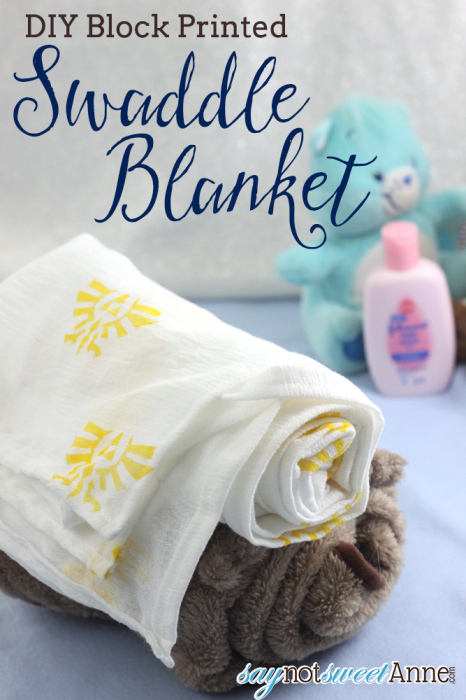 Easy DIY Swaddle Blanket - I printed mine with the Zelda Royal Crest!, but you could stamp your own or buy patterned fabric! | syanotsweetanne.com