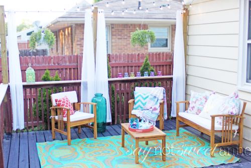 DIY Deck Curtains. Extend your existing deck posts to hold beautiful and luxurious curtains! Plus plenty of bonus deck makeover ideas. | saynotsweetanne.com