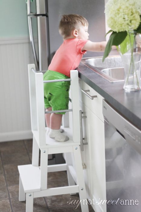Easy DIY Learning tower! Start with an Ikea stool, add 7 dowels and 4 boards! Perfect height for little table helpers. | Saynotsweetanne.com