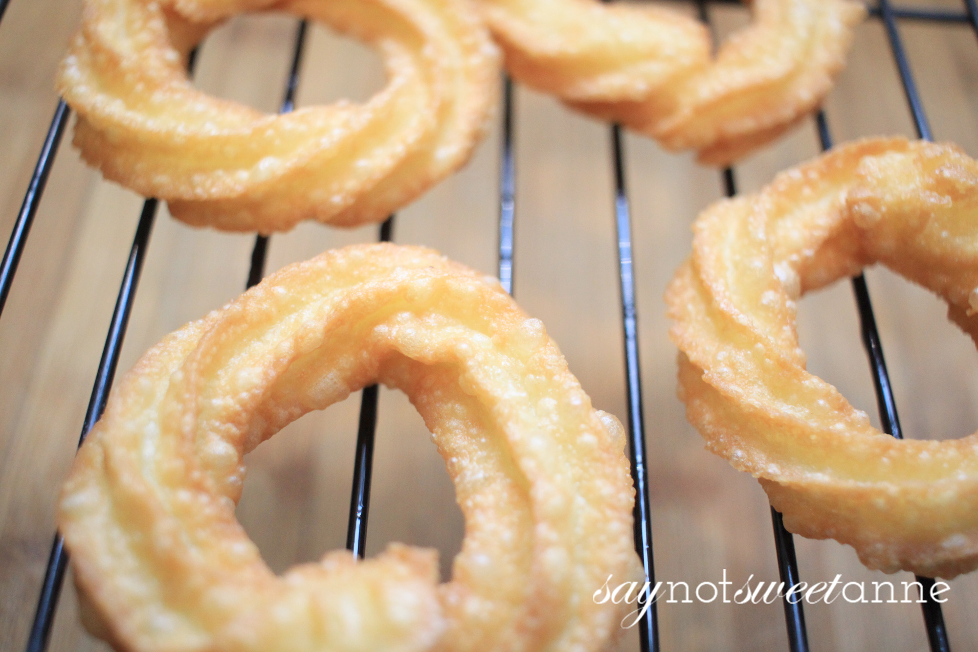 Simplified and Easy French Crullers! Perfect for a weekend treat, or to serve to guests. A time honored and somewhat tricky recipe demystified! |Saynotsweetanne.com