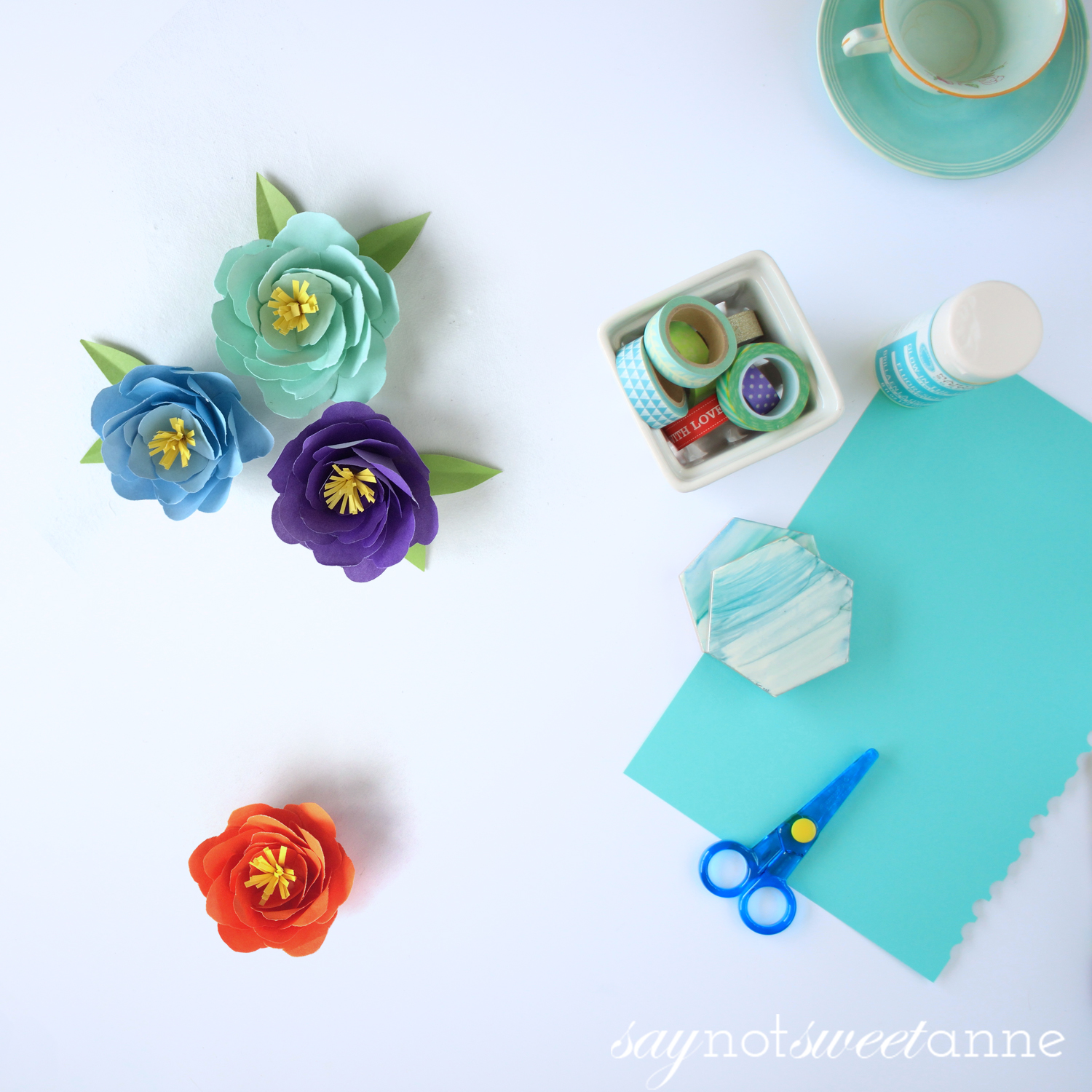 Make beautiful Peony flowers using just paper. Perfect for decor, kids crafts, baby and wedding showers - the works! | saynotsweetanne.com